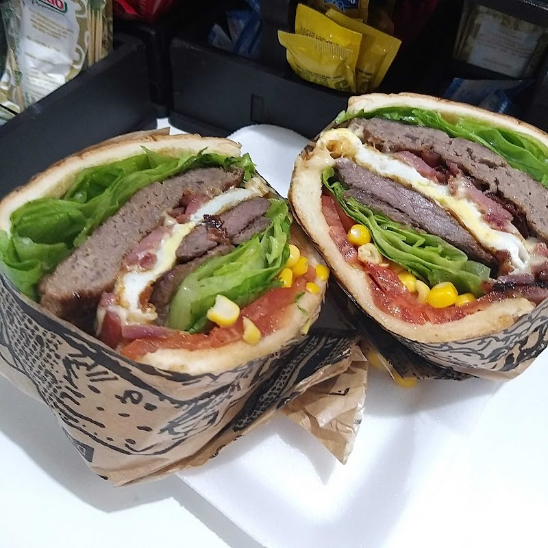 Logo Tradição pizzaria e hamburgueria