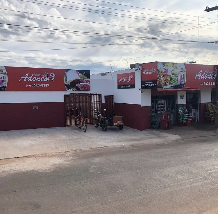 Logo Supermercado Comercial Adones