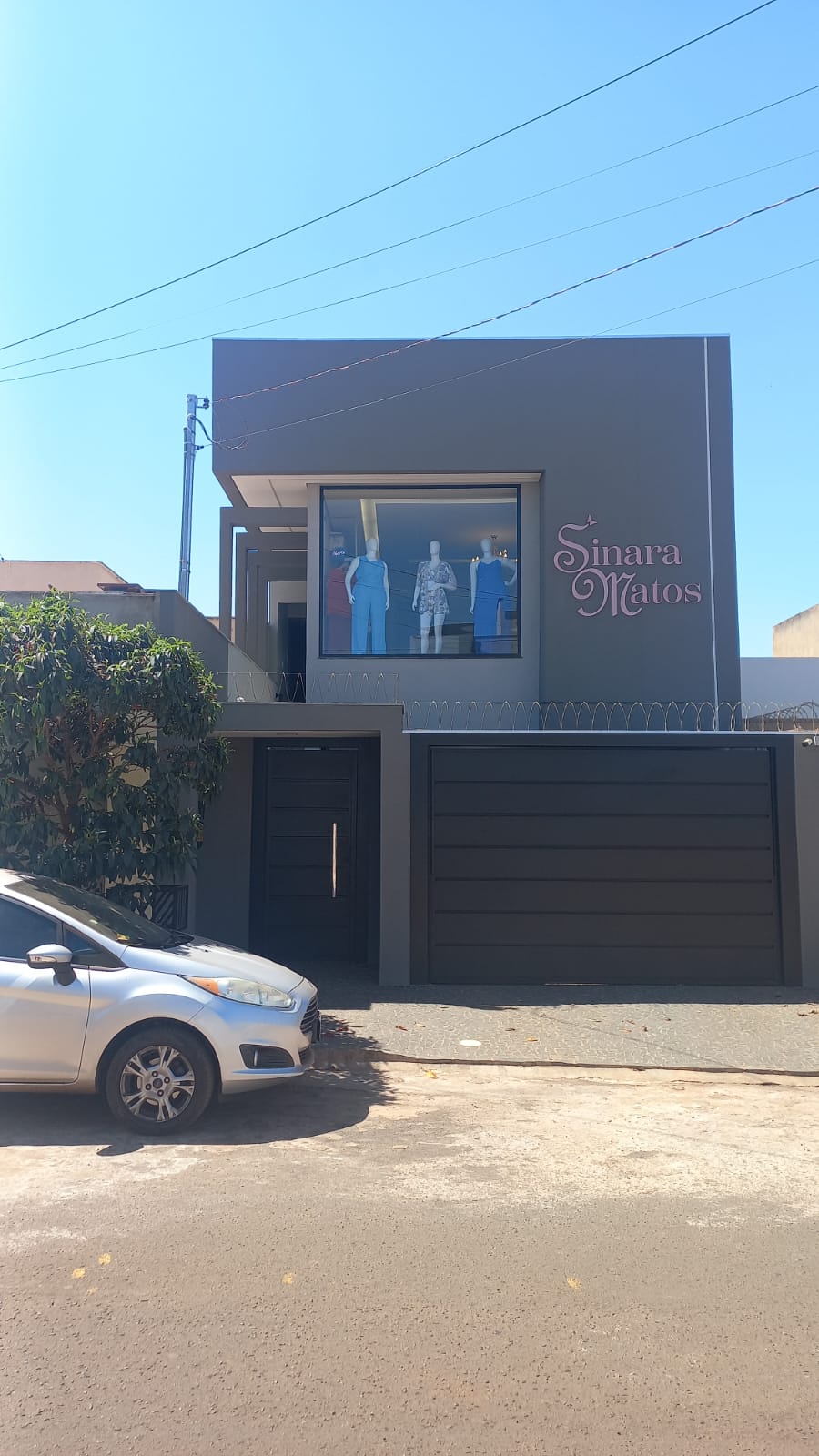 Logotipo da Sinara Matos Plus - Moda Feminina em Rio Verde - GO