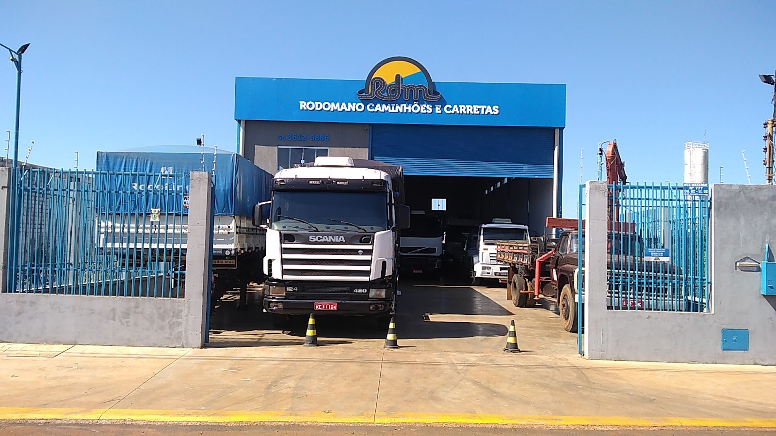 Logotipo da Rodomano Caminhões e Carretas em Rio Verde - GO